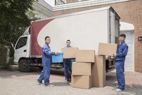 Careful furniture wrapping and loading during a Mayfair home relocation