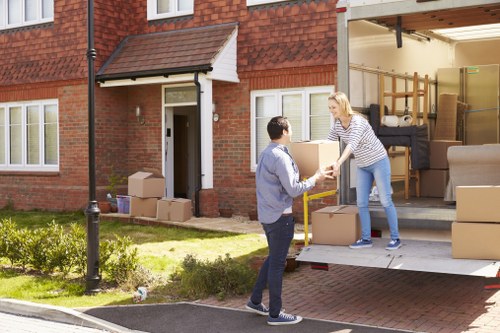 Moving team protecting furniture during a Man With A Van Mayfair job
