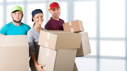 Removal team planning a move in a Mayfair street