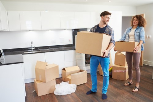 Packed office boxes and equipment ready for transport