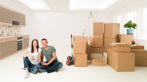 Commercial movers organising office boxes and specialist items for transport