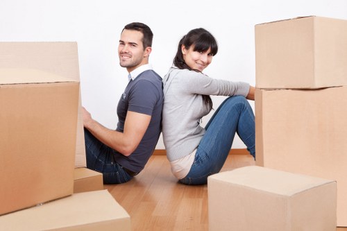 Furniture and box loading into a removal truck in central London