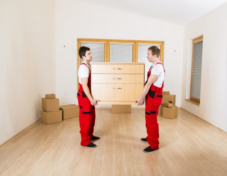 Loading a business relocation vehicle in a Mayfair street with limited access